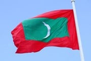 Мальдивы упростили правила выезда из страны // By Adam Jones from Kelowna, BC, Canada - Maldives Flag Flying - Male - Maldives, CC BY-SA 2.0, https://commons.wikimedia.org/w/index.php?curid=64193438